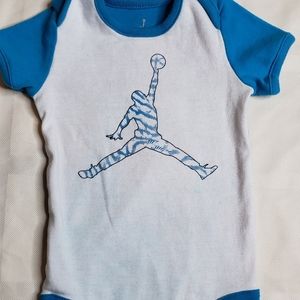 Baby size 6-9 months Jordan onesie